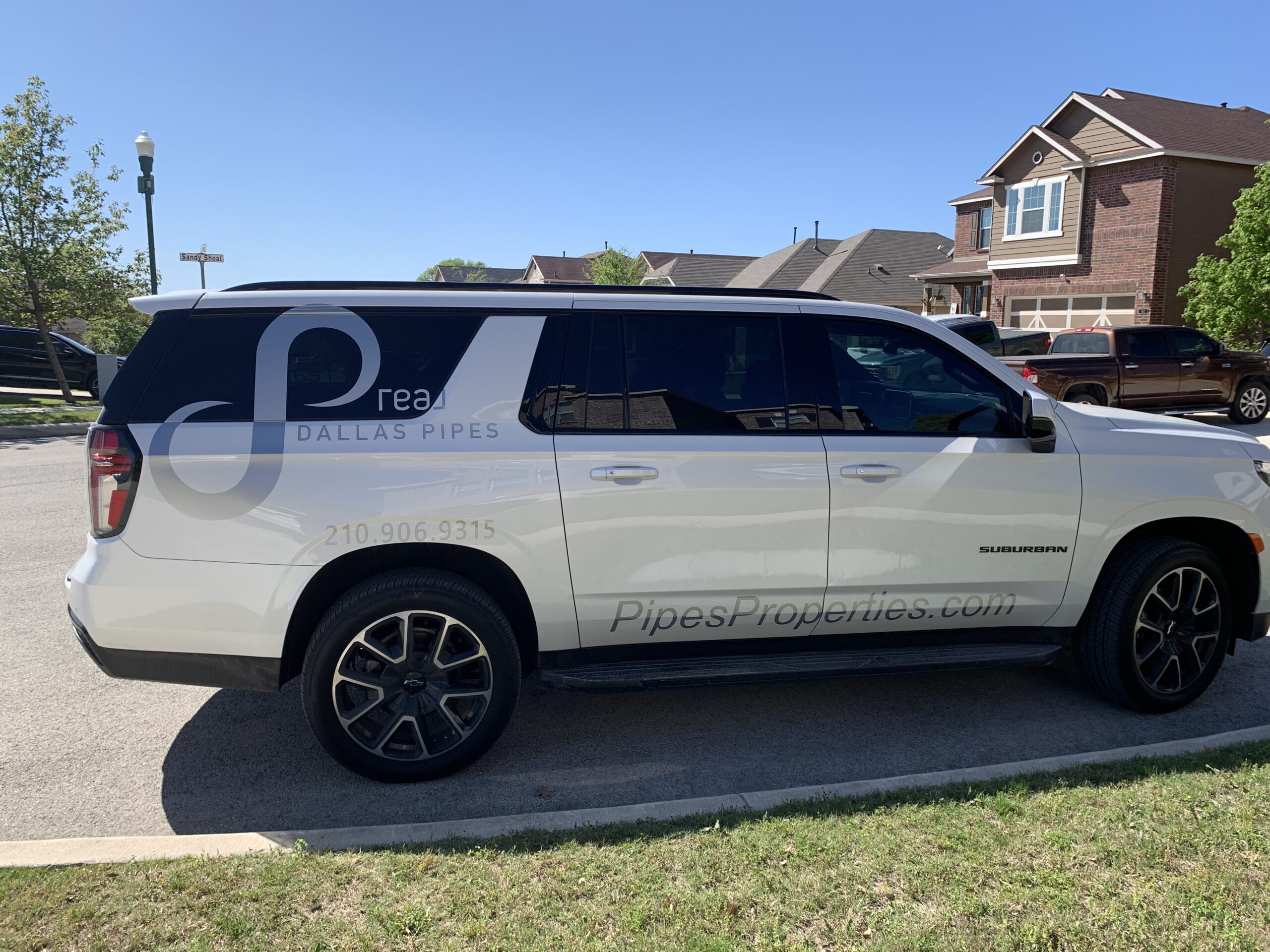 Vehicle graphics on the sides, doors, and windows, of SUV